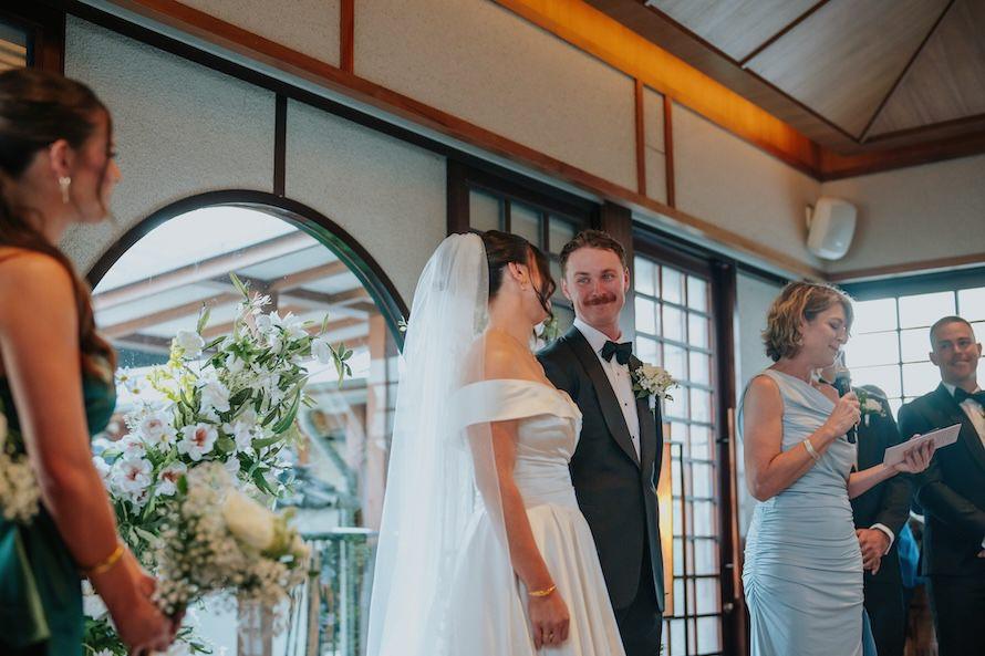 wedding couple glancing at each other during solemnisation at keyaki