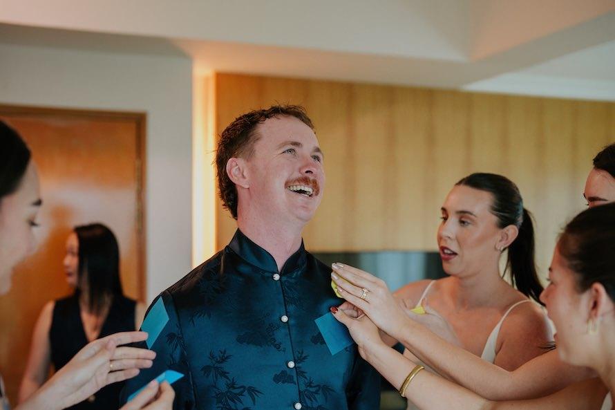 aussie groom enjoying wedding gatecrashing