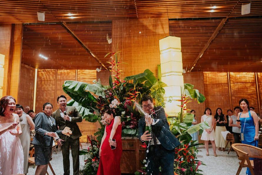 champagne popping spray wedding
